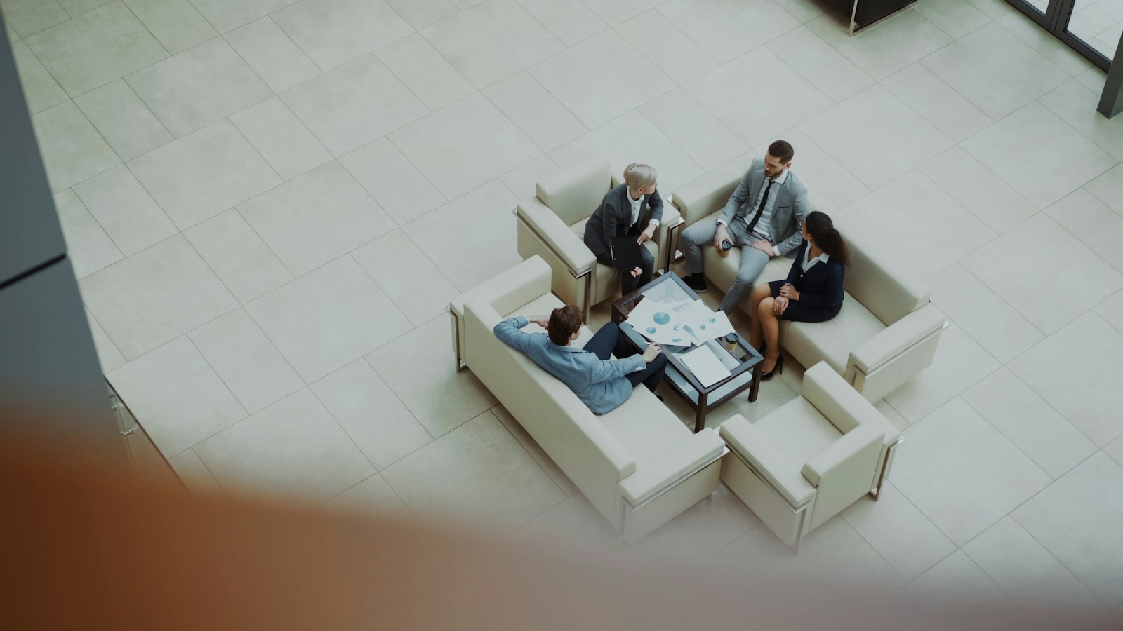 Colleagues discussing business plans in a bright office